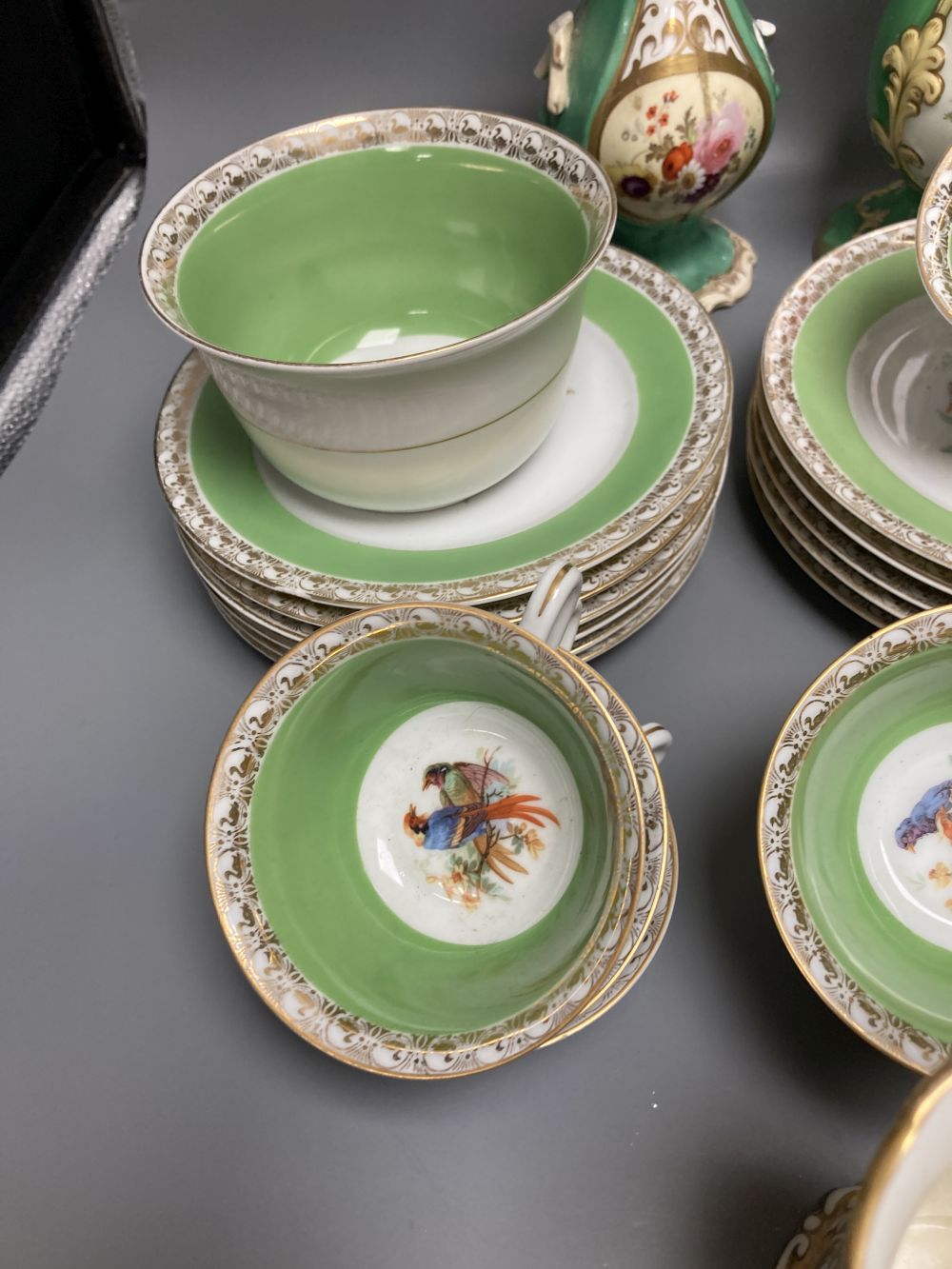 Three English porcelain vases, four dessert plates and a Bohemian green ground teaset, tallest 24cm